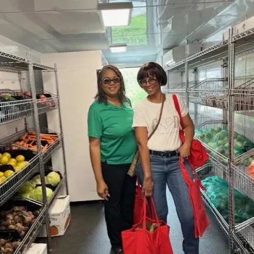 Mia Jones Chief Executive Officer of Agape Family Health and a Event attendant in the Feeding Northeast food Pantry